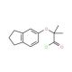 2-(2,3-dihydro-1H-inden-5-yloxy)-2-methylpropanoyl chloride - chemical structure image