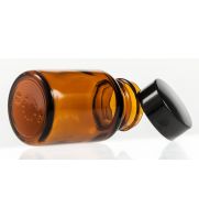 The durable base of the CrystalCruz® Glass Bottle, WM, Amber, 1 oz ensures stability. The amber glass provides optimal pro